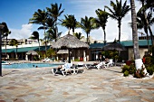 View of swimming pool with sun loungers and parasols Aruba, Netherlands