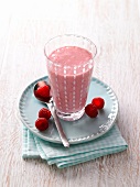 Fat burner drink with raspberries in glass