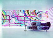 Purple sofa in in front of colourful patterned background