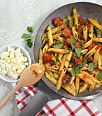 Pasta with tomato caramel in pan