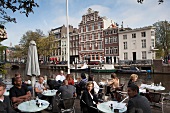 People sitting outside Cafe de Jaren, Amsterdam, Netherlands