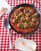 Meatballs with tomato sauce in wok
