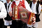 Musicians playing music at Sant'Efisio procession, Pula village, Sardinia, Italy