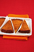 Slices of coconut cake on tray