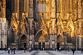 Facade of High Cathedral of Saint Peter and Mary in cathedral square, Cologne, Germany