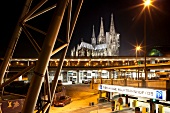 View of main railway station of Cologne Cathedral at night, Germany