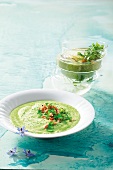 Cold cucumber soup with shrimps and chervil soup with herb brioche in bowl