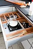 Drawers with compartments and integrated kitchen scale