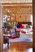 A decorated Christmas tree in a rustic living room