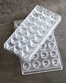 Transparent chocolate molding tray