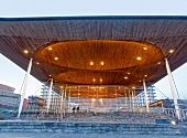Illuminated National Assembly of Wales and parliament building at Cardiff, Wales, UK