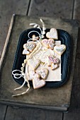 Heart-shaped lemon biscuits decorated with sugar pearls and sprinkles