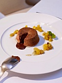 Chocolate cake with caramelized pineapple on plate
