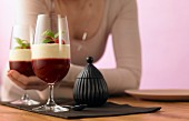 Raspberry jelly with verbena vanilla sauce in dessert glasses