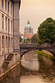 View of castle and bridge at New Town Hall at evening, Linden, Hannover, Germany