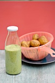 Spinach and yogurt sauce in bottle