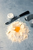 Flour, egg yolk and butter for preparation of short crust, step 1