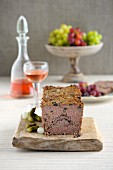 Game terrine with mushrooms and port wine