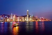 View of cityscape of Victoria harbour at night, Hong Kong