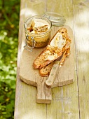 Dripping and lard on wooden chopping board, Bavaria, Germany