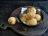 Hamburger buns with sesame seeds in baking tray