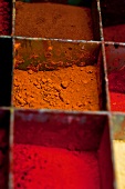 Close-up of red and orange pigments of earth and clay