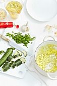 Different types of ingredients for preparation of vegetable stew with mint