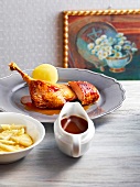 Roasted goose with sauce on plate, Bavaria, Germany