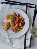 Sicilian meatball with peperonata on white plate