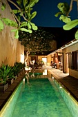 View of pool and restaurant at Fort Printers Hotel in night, Sri Lanka