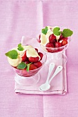 Zabaglione with strawberries and vanilla ice-cream in bowls
