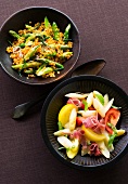 Asparagus salad with red lentils and salads in bowls
