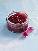 Strawberry and rose jam in jar