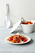 Peppers and mango vegetables on plate and serving bowl