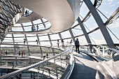 Tourist walking in Reichstag Dome, Berlin, Germany
