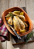 Chicken with fennel and vegetables in Roman pot 