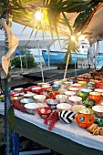 Different painted bowls on table at  Lesser Antilles, Caribbean island, Barbados