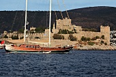 Ship in front of Fort St. Peter in Bodrum Peninsula, Turkey