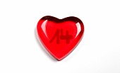 Red heart with number '14' on white background