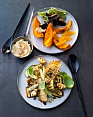 Grilled zucchini, chicory and squash for salad on plate