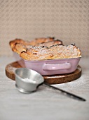 Salzburg dumplings with icing sugar in baking dish