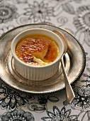 Close-up of creme brulee with passion fruit in mold