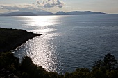View of sea and mountain at dusk in Dilek Peninsula National Park, Turkey
