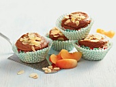 Apricots and chocolate muffins in cupcake cases