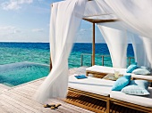 Gazebo deck with canopy next to sea