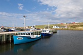 Fishing boat moored at harbor point in Cape Breton Island, Canada