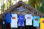 T-shirts hanging on roof of shop in Zanzibar, Tanzania, East Africa