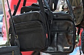 Close-up of various black bags