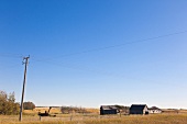 View of abandoned houses on Highway 2, Saskatchewan, Canada