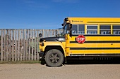 View of yellow school bus at Watrous town on Highway 2, Saskatchewan, Canada